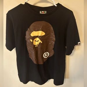 Bape face tee. Heavy cotton feel. Really nice quality!